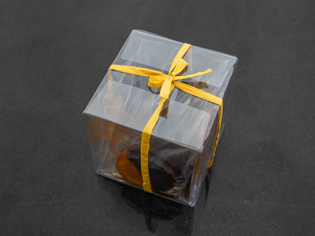 Slices of orange confit dipped in dark chocolate